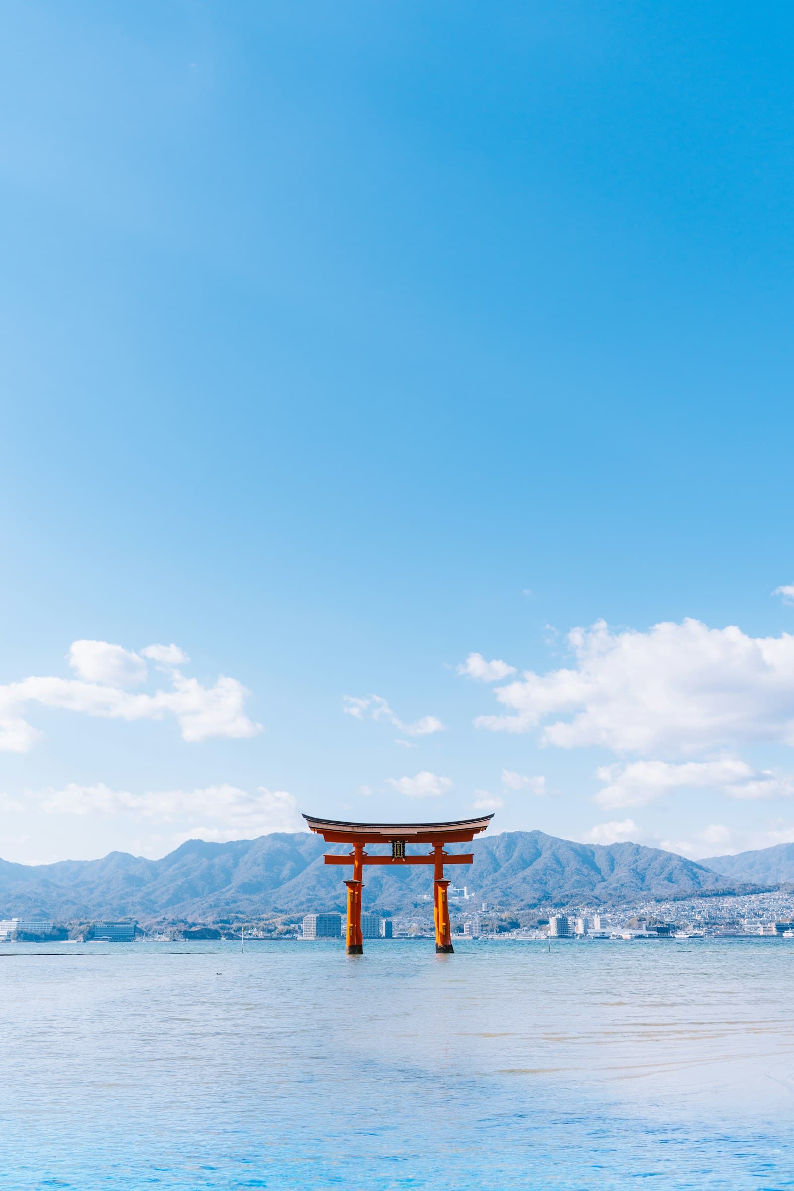 Itsukushima shrine's floating torii gate at Miyajima island in autumn