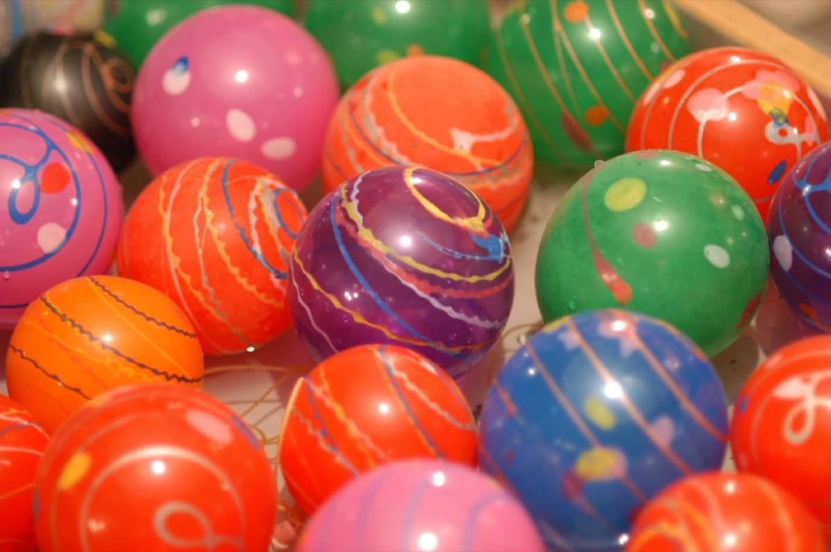 Colorful festival stall games and toys, a classic sight at a Japanese summer matsuri