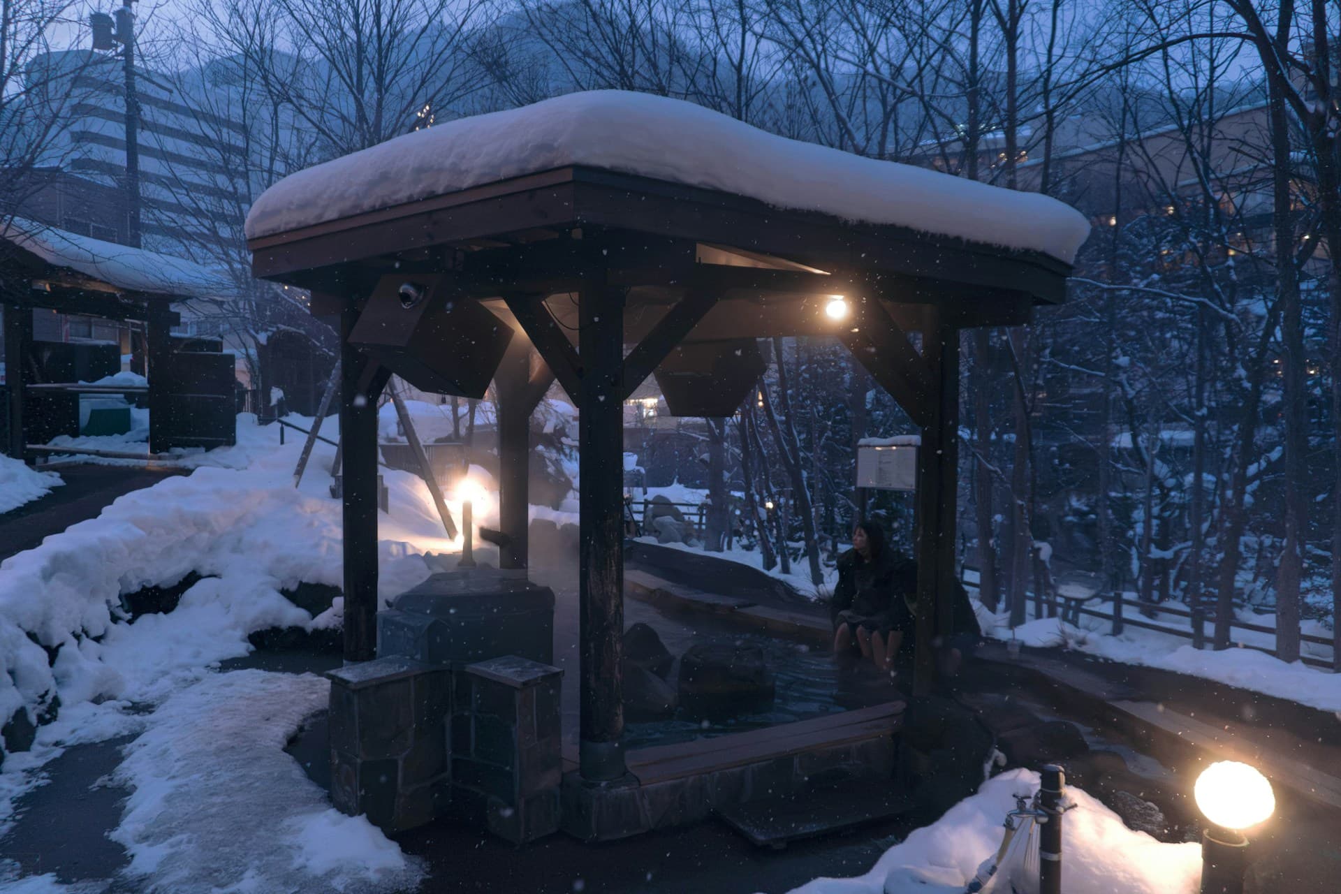 Outdoor hot spring bath in snow in Japan